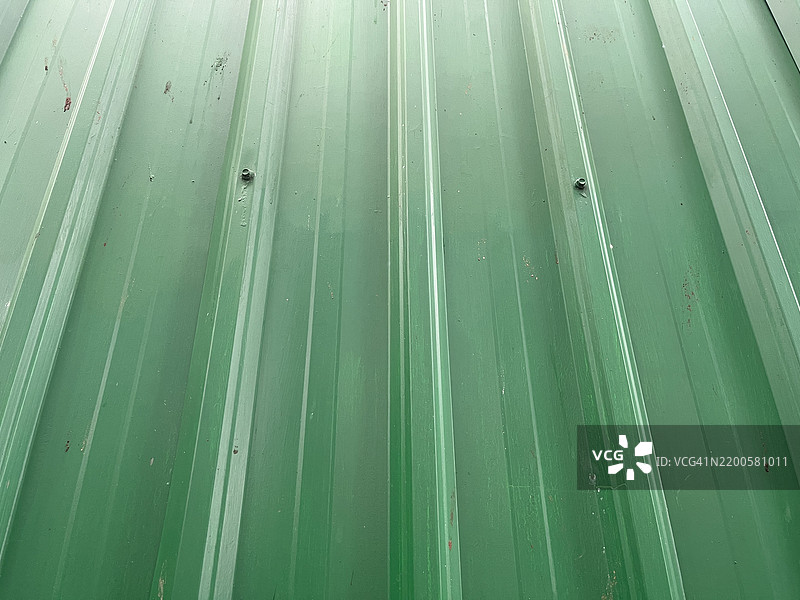 绿色背景与有纹理的绿色墙壁图片素材