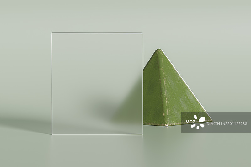室内半透明玻璃后面的绿色金字塔图片素材