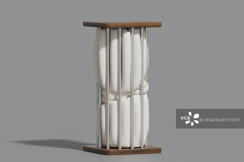 现代布料雕塑置于监狱般的结构中，配有木制栏杆图片素材