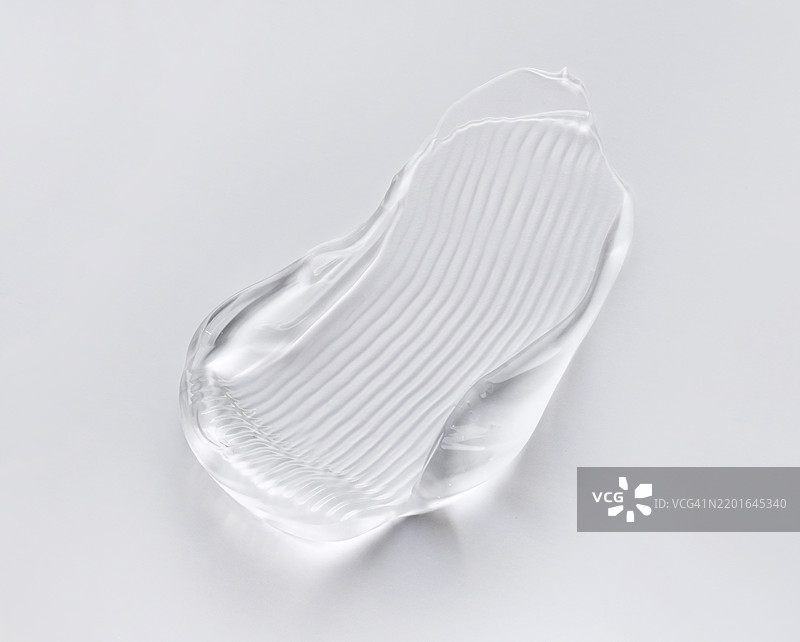 浅色背景上的化妆品质地乳霜凝胶图片素材