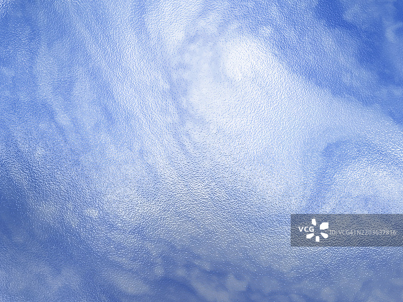 蓝白背景上的光滑粗糙纹理塑料片特写。图片素材