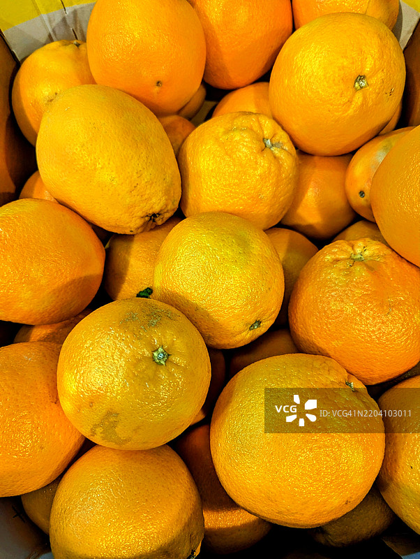 市场上的橙色水果，特写镜头图片素材