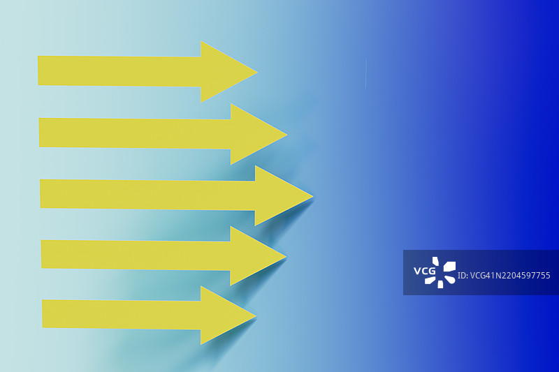 渐变蓝色背景上的风格化黄色箭头图片素材