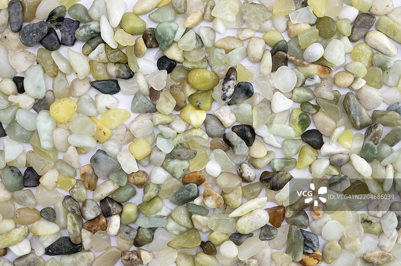 一堆石头，其中有一些黄色和白色的石头图片素材