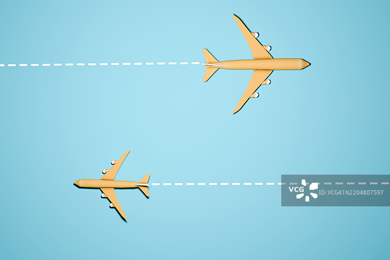 飞机旅行概念与蓝色背景图片素材