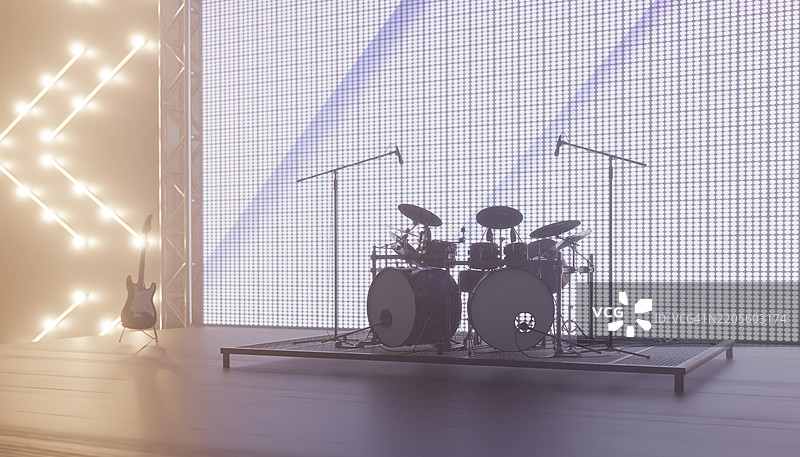 空荡荡的舞台上，鼓组和电吉他静静等待着音乐家们的到来图片素材