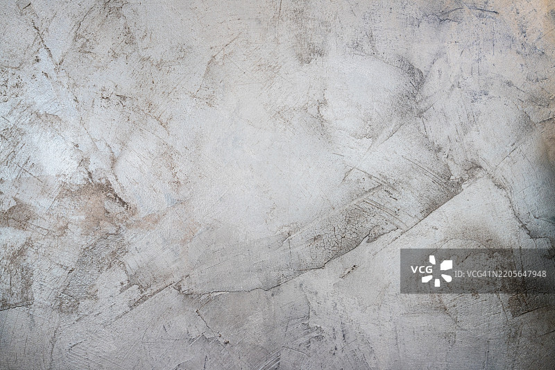 抽象的纹理水泥表面，带有粗糙的图案和中性色调图片素材