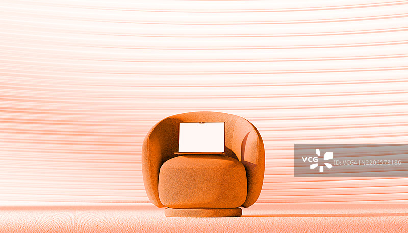 现代客厅中，放在橙色扶手椅上的一台黑屏笔记本电脑图片素材