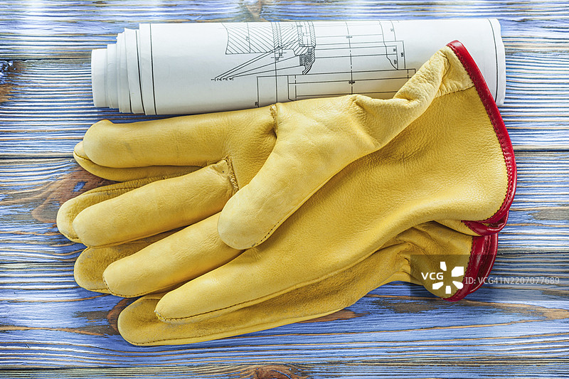 复古木板上的皮革安全手套施工图纸图片素材