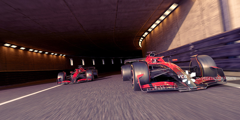 两辆赛车从隧道驶出图片素材