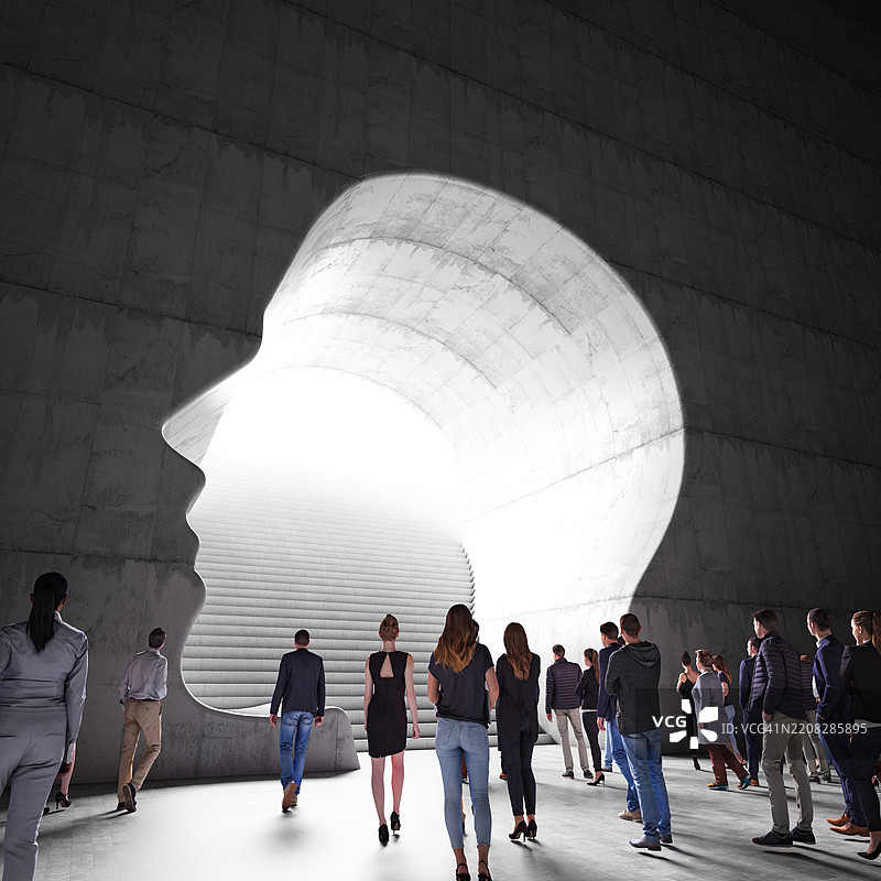 3D人物进入人头形状的墙壁图片素材