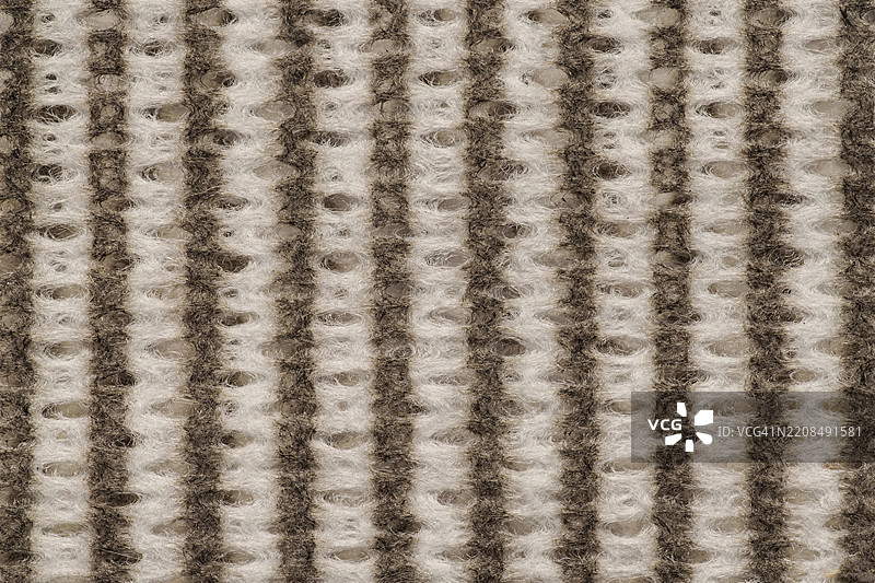 棕色和白色的布料图案。图片素材