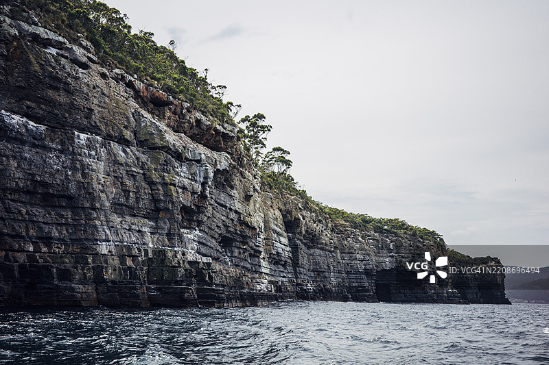 德维尔斯厨房，鹰鹰颈海岸悬崖景观，塔斯曼国家公园保护区，波特亚瑟，塔斯马尼亚图片素材