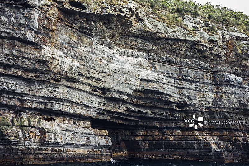 德维尔斯厨房，鹰鹰颈海岸悬崖景观，塔斯曼国家公园保护区，波特亚瑟，塔斯马尼亚图片素材