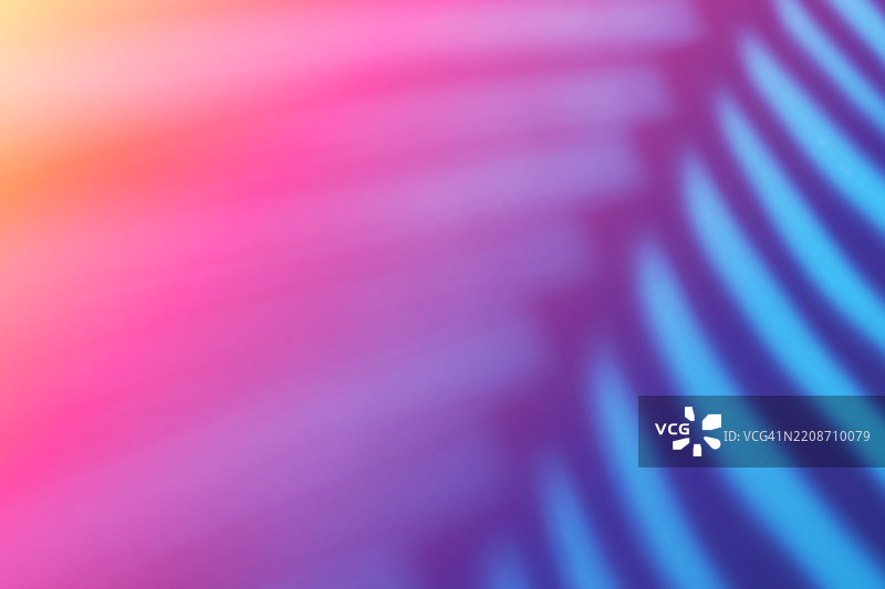 色彩斑斓的抽象背景，带有热带阴影和渐变光谱图片素材