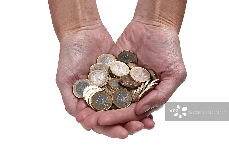 许多人手中拿着一欧元硬币图片素材
