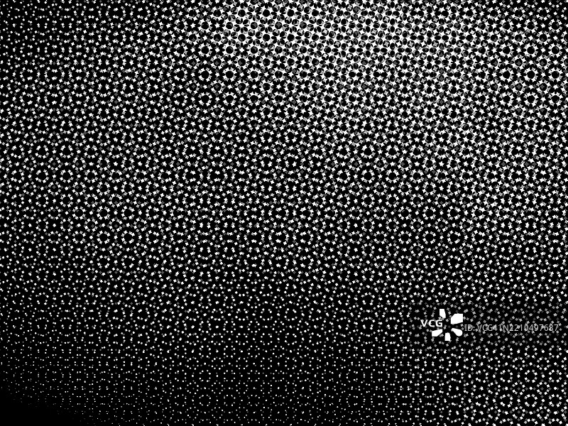 黑色背景上的小红色、绿色、蓝色和粉色方块图片素材