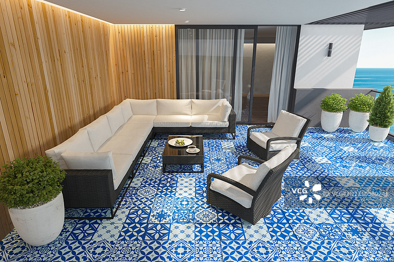 现代露台配有黑色藤制家具和摩洛哥蓝色瓷砖地板图片素材