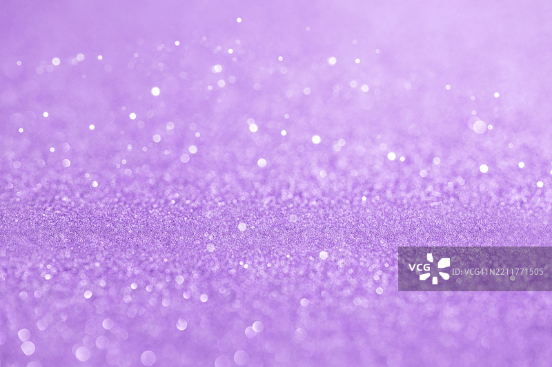 薰衣草色闪闪发光的散景灯光背景图片素材