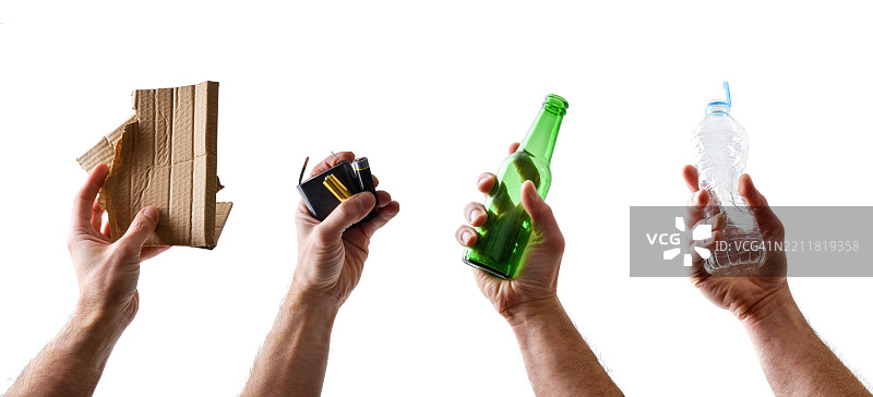 一组手在收集不同类型的废物进行回收图片素材
