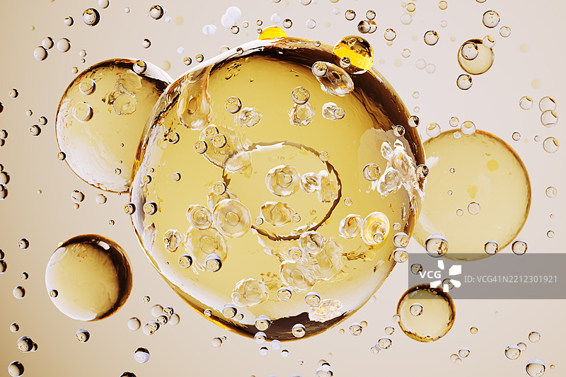 金色精华泡泡漂浮并反射光线，营造出奢华的美容背景图片素材