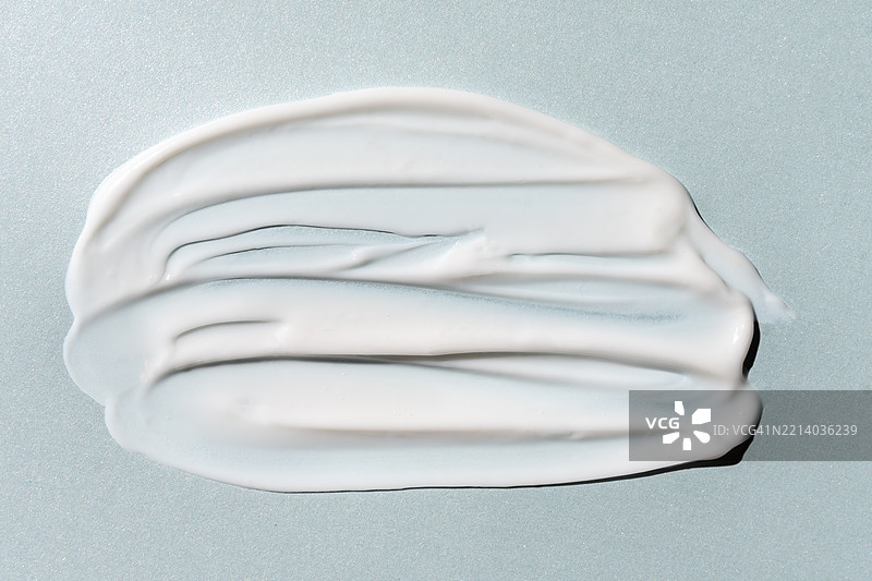 质感白色涂抹抗衰老护肤霜或身体乳液图片素材