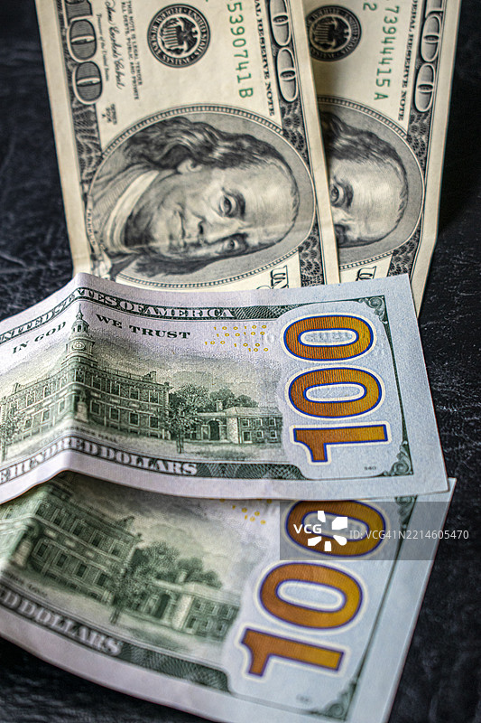 100美元现金钞票。旧版和新版。货币，经济，美国货币，关税。图片素材