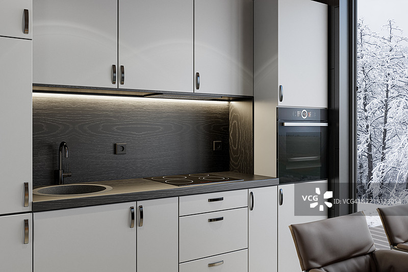 浅灰色紧凑型厨房，配有黑橡木台面和背板图片素材