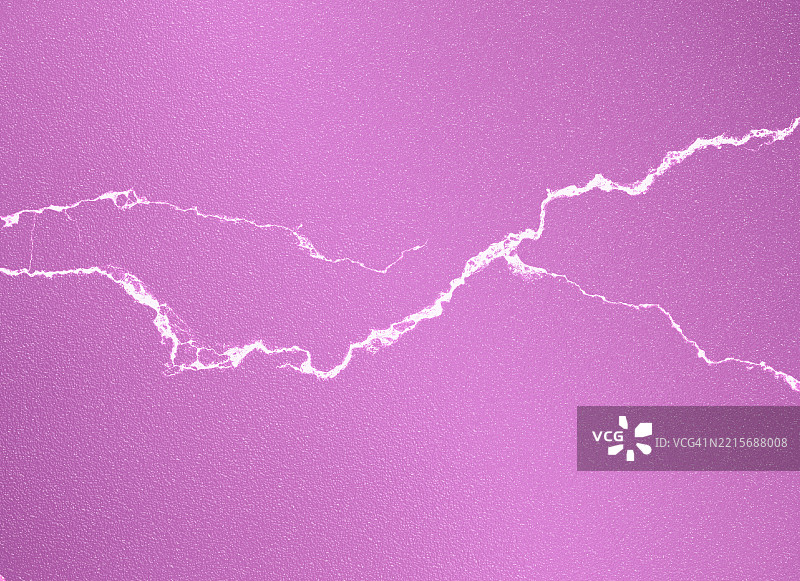 光滑的粉色粗糙表面上有白色裂纹。图片素材