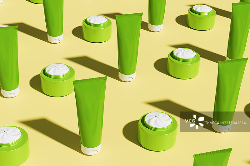 绿色化妆品管和面霜罐的3D渲染图案，背景为黄色。自然护肤产品的概念设计。极简布局，搭配大胆的阴影和鲜艳的色彩。图片素材