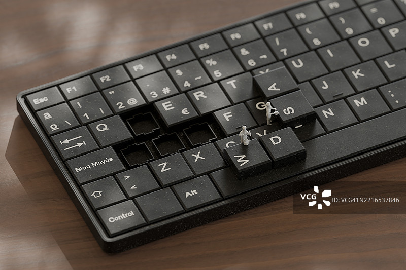 微小的人在3D概念中使用键盘工作图片素材