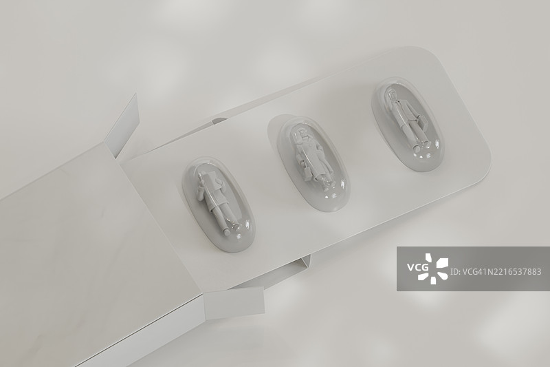 3D艺术作品：小人们在泡罩包装中的胶囊里图片素材