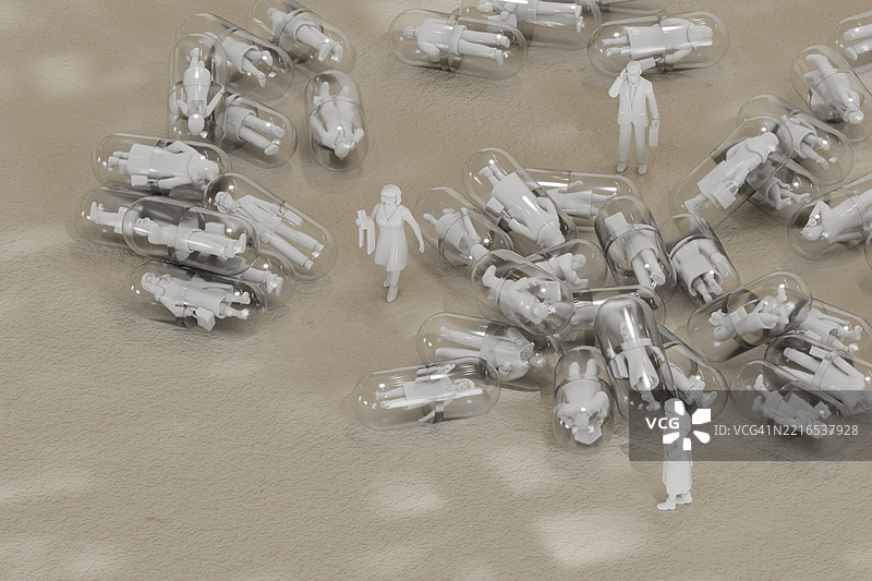 艺术装置中透明胶囊内封装的微型人物图片素材