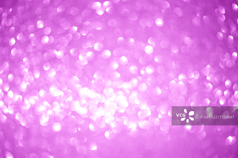 紫色虚化抽象背景，带有柔和的光晕和光线图案图片素材