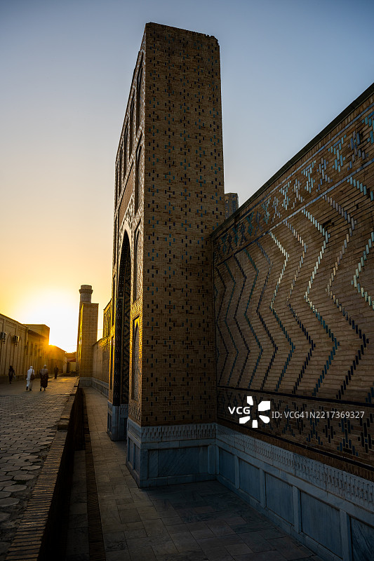 撒马尔罕比比·哈尼姆清真寺外墙的日落图片素材