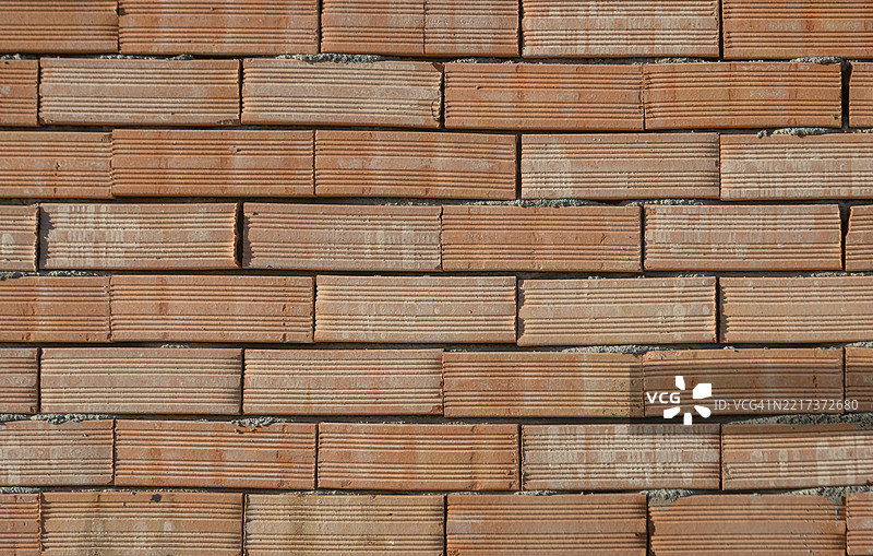 红砖墙纹理背景，表面粗糙图片素材