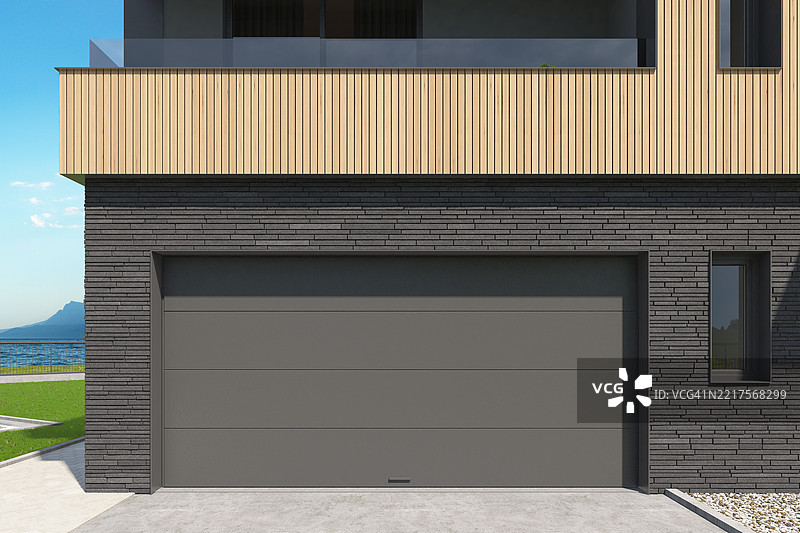 现代双车库入口，配有深色分段卷帘门图片素材