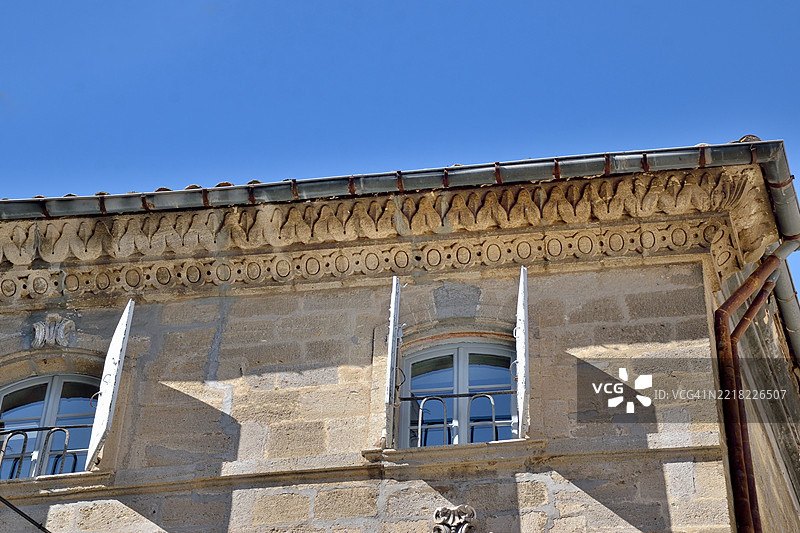 佩泽纳斯，克莱贝尔街上的古老雕刻的热那亚面包。图片素材