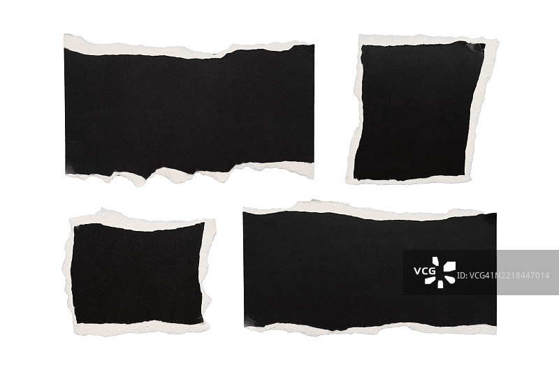 撕裂的黑色纸张，背景为白色图片素材