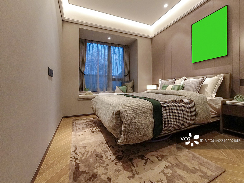 现代卧室室内设计，带有绿色屏幕墙面特色图片素材