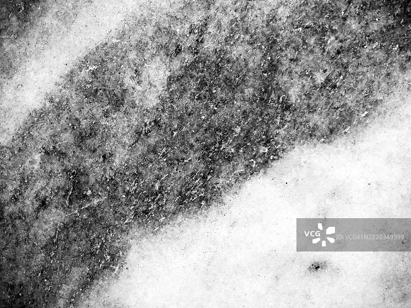 白色和灰色大理石墙的特写，带有纹理。阳光。黑白。全画幅 4:3。纽约州曼哈顿，美国。图片素材