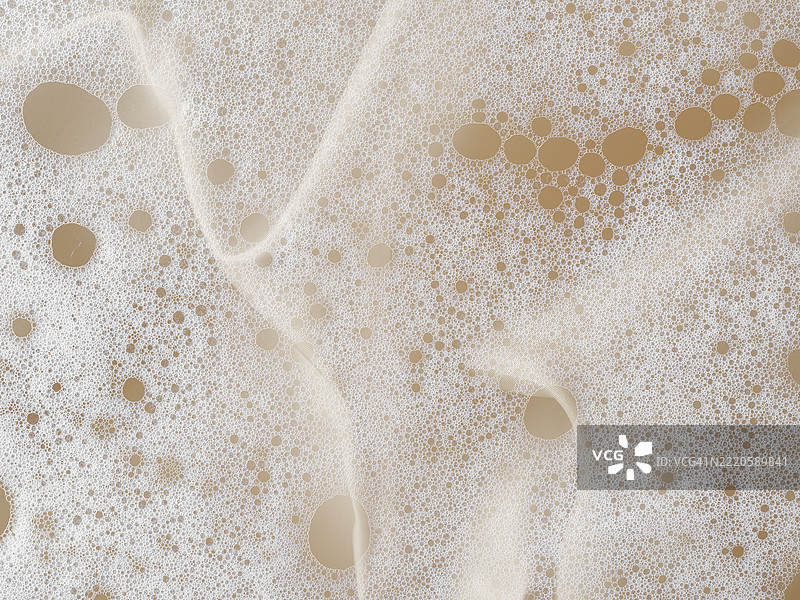 柔和米色调的丝绸布料上混合着浮雕泡沫和肥皂泡。图片素材