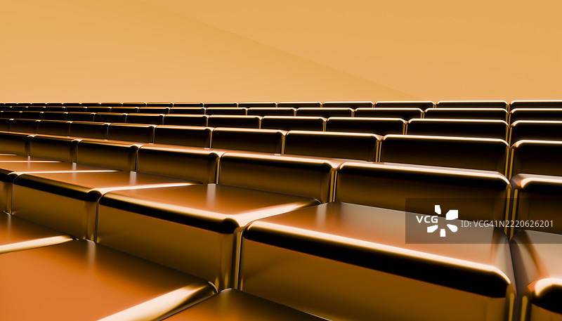 金色座椅排成几何图案，延伸至地平线。图片素材