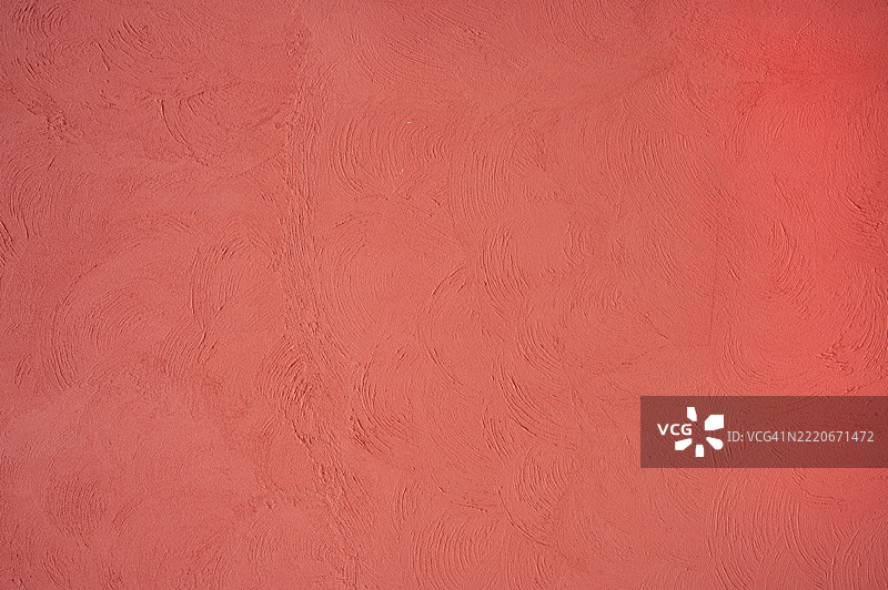 红色墙壁纹理背景的全景拍摄图片素材