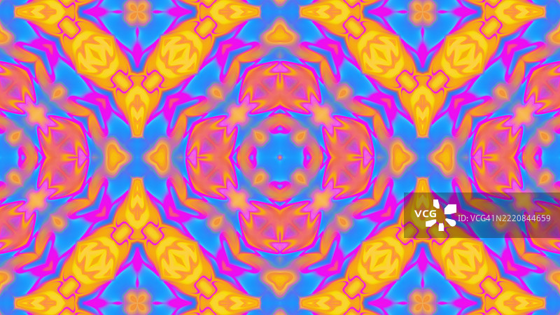 色彩斑斓的蓝色和黄色万花筒图案。对称的抽象设计，采用鲜艳的蓝色、黄色和粉色调，形成大胆的万花筒图案。图片素材