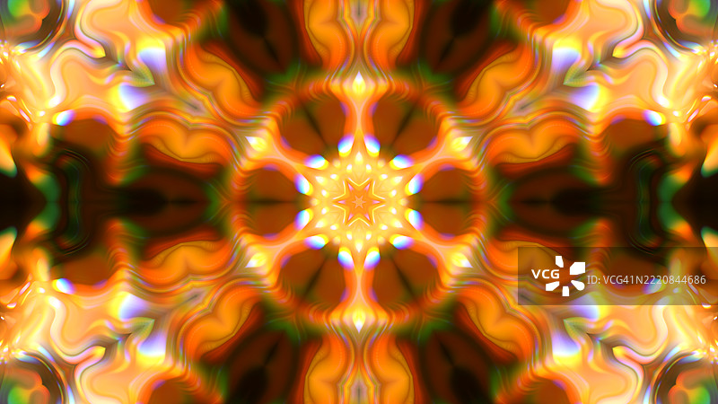 温暖色调的曼陀罗灵感万花筒。对称的万花筒图案，呈现出橙色、黄色和大地色调的发光曼陀罗设计。图片素材