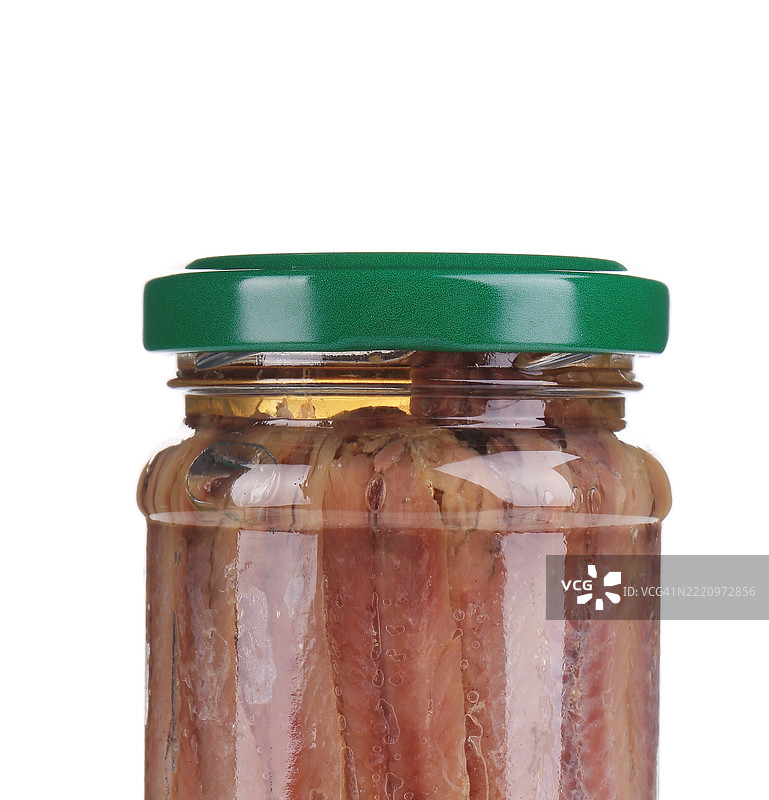 白色背景下罐子里的食物特写图片素材