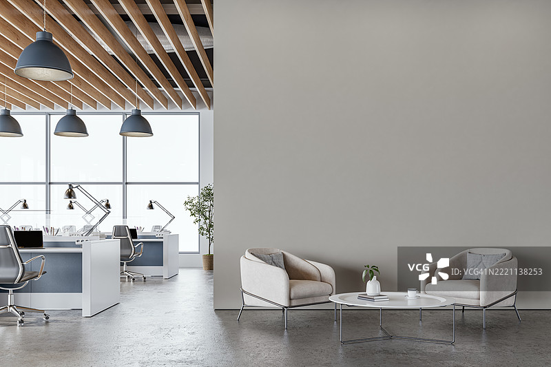 现代办公室内部，浅灰色墙壁和极简主义休息区，微水泥地面图片素材