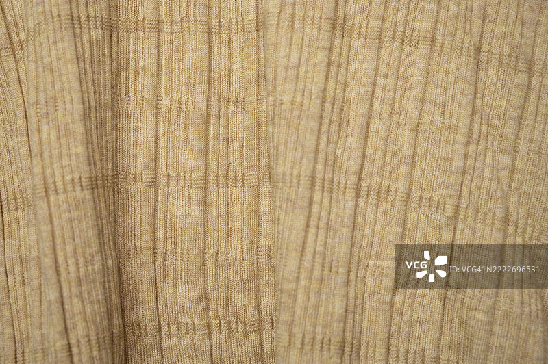 柔软的黄色针织面料特写图片素材