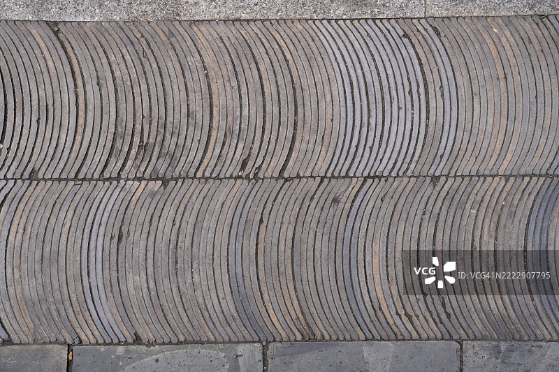 带有圆形图案的纹理石铺路的特写镜头图片素材